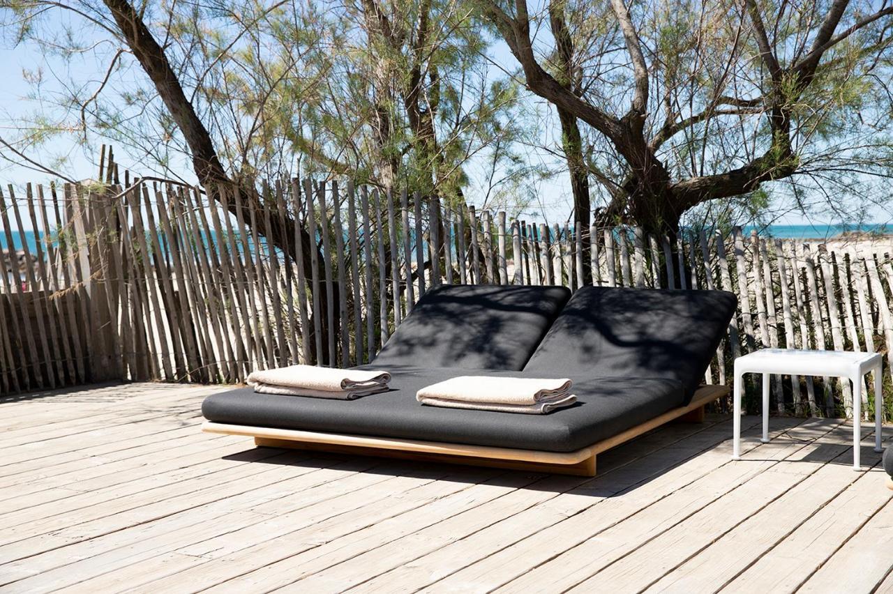 Hotel Plage Palace & Spa Palavas-les-Flots Exteriör bild The deck at the beach