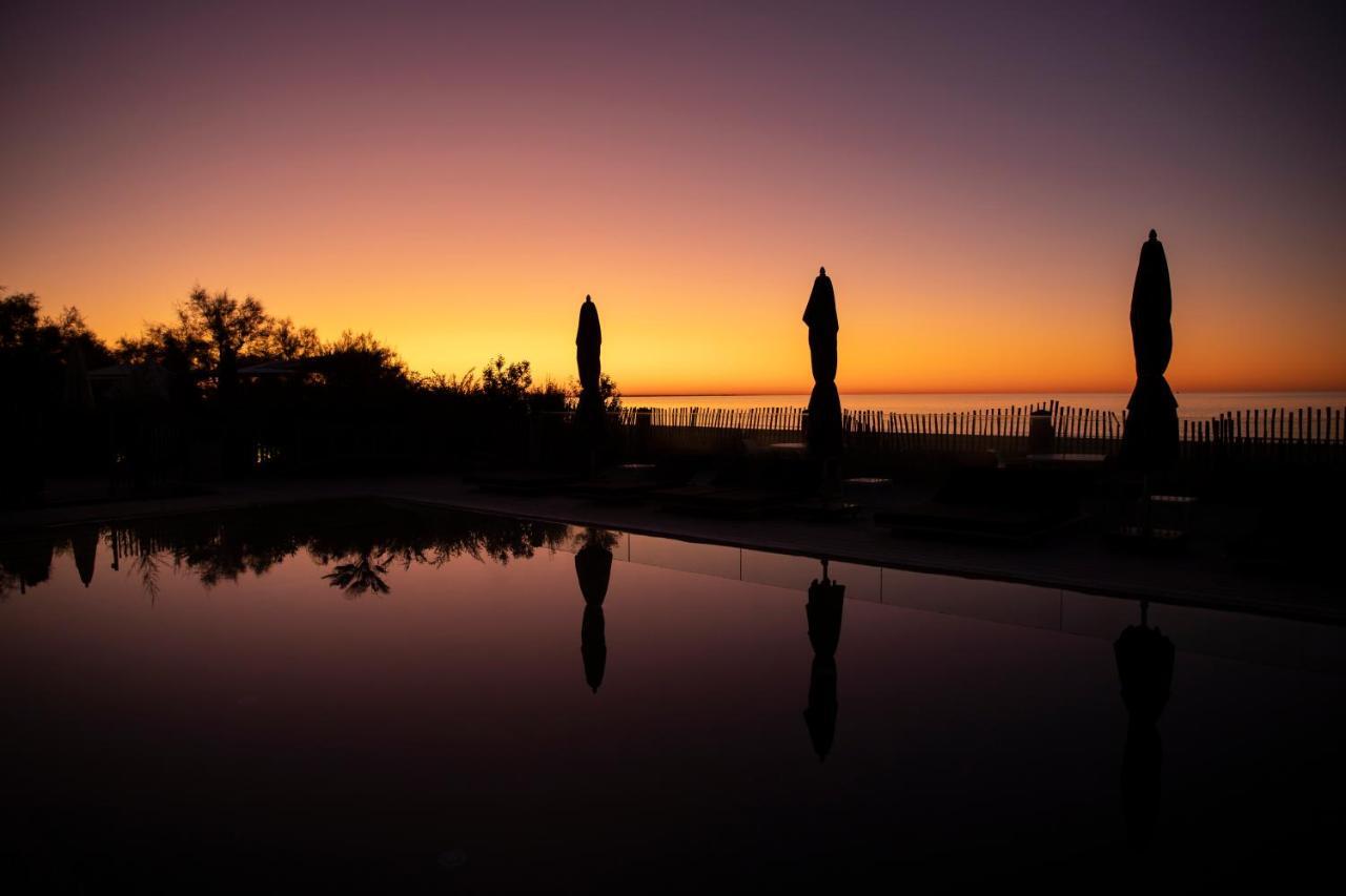 Hotel Plage Palace & Spa Palavas-les-Flots Exteriör bild Sunset at the San Diego Veterans Memorial Cemetery